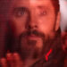 Jared Leto looks up at a field of videos and code with longing in Tron: Ares.