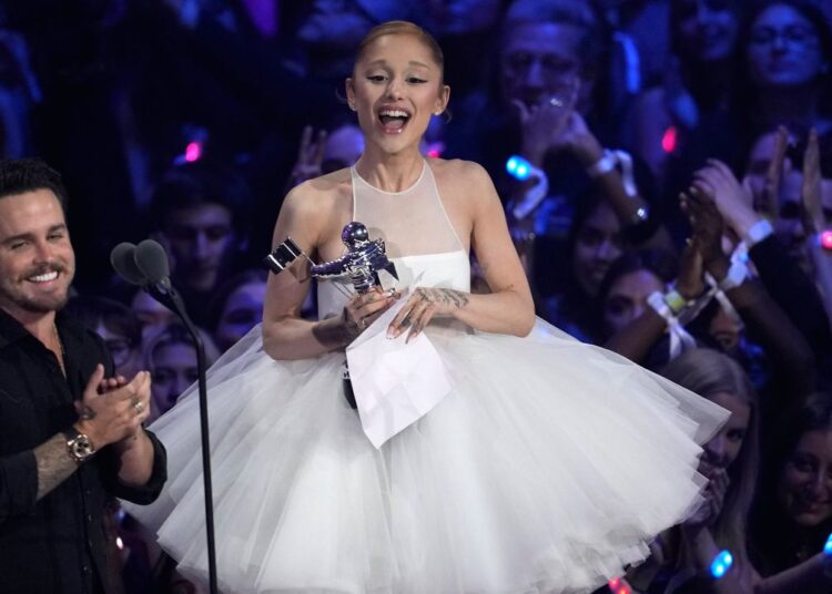 Christian Breslauer, left, and Ariana Grande accept the award for video of the year for "Brighter Days Ahead" during the MTV Video Music Awards on Sunday, Sept. 7, 2025, at UBS Arena in Elmont, N.Y. (Photo by Charles Sykes/Invision/AP)