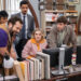 The characters around a computer screen in The Paper.