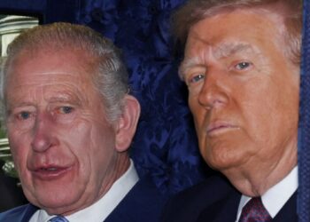 As Trump enjoys the pomp of the Royal Family, America is in uproar