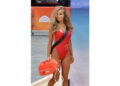 Carmen Electra wears the Baywatch red swimsuit