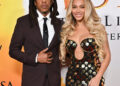 Beyoncé and Jay-Z posing on the red carpet.