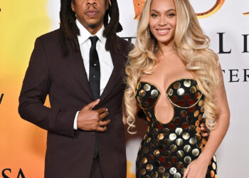 Beyoncé and Jay-Z posing on the red carpet.