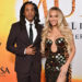 Beyoncé and Jay-Z posing on the red carpet.