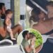 Bikini-clad Gisele Bündchen and Joaquim Valente cuddle baby boy on boat trip