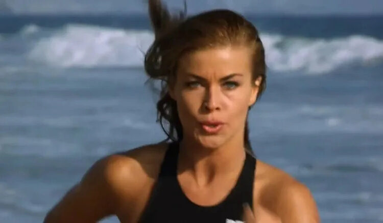 Lani McKenize jogging on the beach on Baywatch