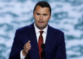 CEO of Turning Point USA Charlie Kirk speaks on stage on the first day of the Republican National Convention at the Fiserv Forum on July 15, 2024 in Milwaukee, Wisconsin.