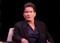 Charlie Sheen sitting