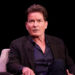 Charlie Sheen sitting