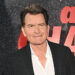Charlie Sheen poses at the premiere of his documentary.