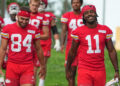 Jul 22, 2025; St. Joseph, MO, USA; Kansas City Chiefs wide receivers Mac Dalena (84) and Jalen Royals (11) walk down the hill to the practice fields during training camp at Missouri Western State University. Mandatory Credit: Denny Medley-Imagn Images