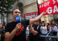 British actor Khalid Abdalla speaks out against war in Gaza during a pro-Palestinian protest outside Downing Street, London.