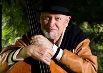 Danny Thompson, pictured holding one of his upright basses .