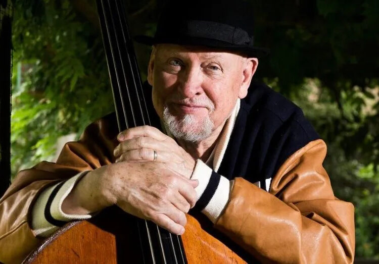 Danny Thompson, pictured holding one of his upright basses .