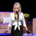 Dolly Parton at the microphone