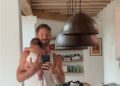 Calvin Harris beamed as he shared a new picture of his newborn son Micah on Tuesday while also teasing brand new music