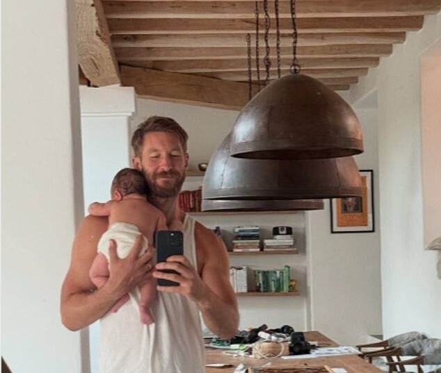Calvin Harris beamed as he shared a new picture of his newborn son Micah on Tuesday while also teasing brand new music