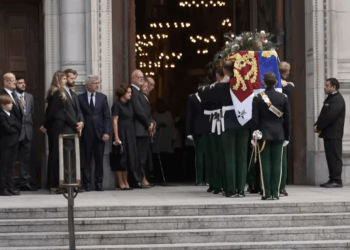 The Duke of Kent watches as the coffin of the Duchess of Kent is brought into Westminster Cathedral