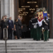 The Duke of Kent watches as the coffin of the Duchess of Kent is brought into Westminster Cathedral