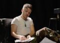 Quinn Gasaway plays an American soldier whose journey from enlistment and deployment to reintegration into society makes up  “Death of Kings,” a one-man show by Arkansas native and Army veteran Ben Grimes, Friday-Sunday at the Arkansas Museum of Fine Arts in Little Rock.
(Special to the Democrat-Gazette)