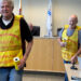 Knights of Columbus Spalding Council 427 members Jim Wygle (left) and Jerry Campen circulate through East Peoria City Council chambers during Tuesday's meeting to hand out Tootsie Rolls and get an early start on the Knights of Columbus 2025 Support Citizens with Intellectual Disabilities Tootsie Roll Drive.