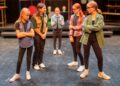 The Young People's Theatre production of "Girl Who Wears Glasses" features Sienna Gray, center, who ends up in the of a battle between the girls who don't wear glasses, at left, Eva Vogel and Emmory Hanson, and the girls who wear glasses, Julie Moffett and Bridget Schaff. Photo courtesy of Aberdeen Community Theatre.