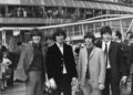 Hundreds of teenagers gather at London Airport on Aug. 13, 1965, to send The Beatles off to America, where they'd meet Elvis Presley two weeks later. From left: John Lennon, George Harrison, Ringo Starr and Paul McCartney.
