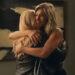 Erin Simkin/Apple TV+ Bradley (Reese Witherspoon) and Alex (Jennifer Aniston) share a hug on 'The Morning Show'