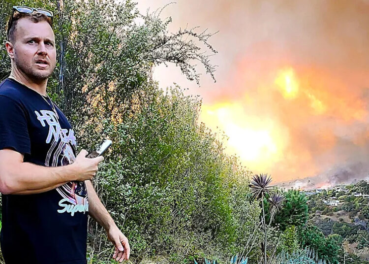 Spencer Pratt overlooking wildfire approaching home