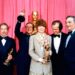 Diane Keaton (centre) wearing an Armani men's suit jacket at the 1978 Academy Awards. Pic: AP