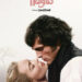Margot Robbie and Jacob Elordi in a dramatic close up on  a "Wuthering Heights" poster