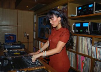 Picture of an Asian woman DJing