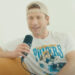 Jake Shane/YouTube Glen Powell on 'Therapuss' with Jake Shane.