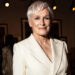 Glenn Close in a white suit at the Ralph Lauren fashion show in April 2024