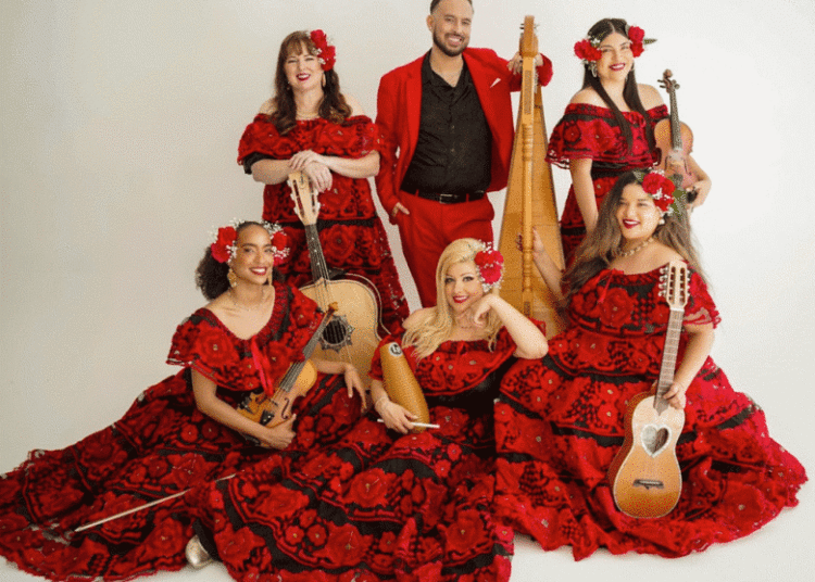 ¡Viva el Arte de Santa Bárbara! performers in red and black costumes gather for a group photo. (Courtesy photo)