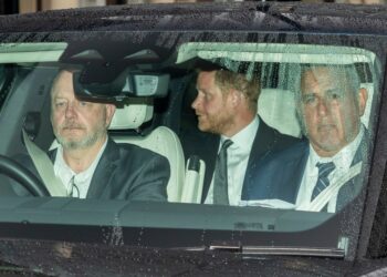 Prince Harry leaving Clarence House in a car.