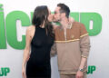 Pete Davidson and Elsie Hewitt kiss on the red carpet at an event for