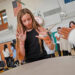 Students get their hands on a large timpani and tap it to see how it sounds. The Point Webster Middle School in Quincy received a grant from the Music Drives Us organization of $65,000 in musical instruments for the school band and music program on Tuesday, Sept. 9, 2025.
