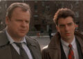 Greevey and Logan talking to a witness in Law & Order Season 1x01.