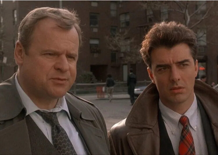 Greevey and Logan talking to a witness in Law & Order Season 1x01.