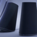Sony Pulse Elevate speakers in black against a swirly blue background