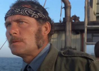 Quint in Jaws looking out to sea. .