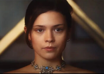 Ruby in a necklace getting all dolled up in Amazon's Maxton Hall.