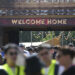 People enter the DreamVille camping site, at the Tomorrowland electronic music festival on July 17, 2025, in Boom.