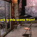 An empty rustic room with a single chair facing a glass door, captioned "Where is this scene from?"