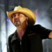 Jason Aldean holding microphone during 2025 CMA Fest