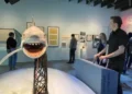 Museum visitor Daniel Stoffler tries his hand operating a replica of the mechanical shark from Jaws