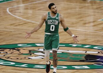 May 14, 2023; Boston, Massachusetts, USA; Boston Celtics forward Jayson Tatum (0) celebrates after making a three point basket against the Philadelphia 76ers during the second half of game seven of the 2023 NBA playoffs at TD Garden. Mandatory Credit: Winslow Townson-Imagn Images