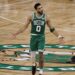 May 14, 2023; Boston, Massachusetts, USA; Boston Celtics forward Jayson Tatum (0) celebrates after making a three point basket against the Philadelphia 76ers during the second half of game seven of the 2023 NBA playoffs at TD Garden. Mandatory Credit: Winslow Townson-Imagn Images
