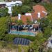 The estate sprawls across nearly 5,000 square feet with four spacious bedrooms and five bathrooms.